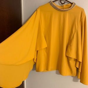 Cape yellow blouse